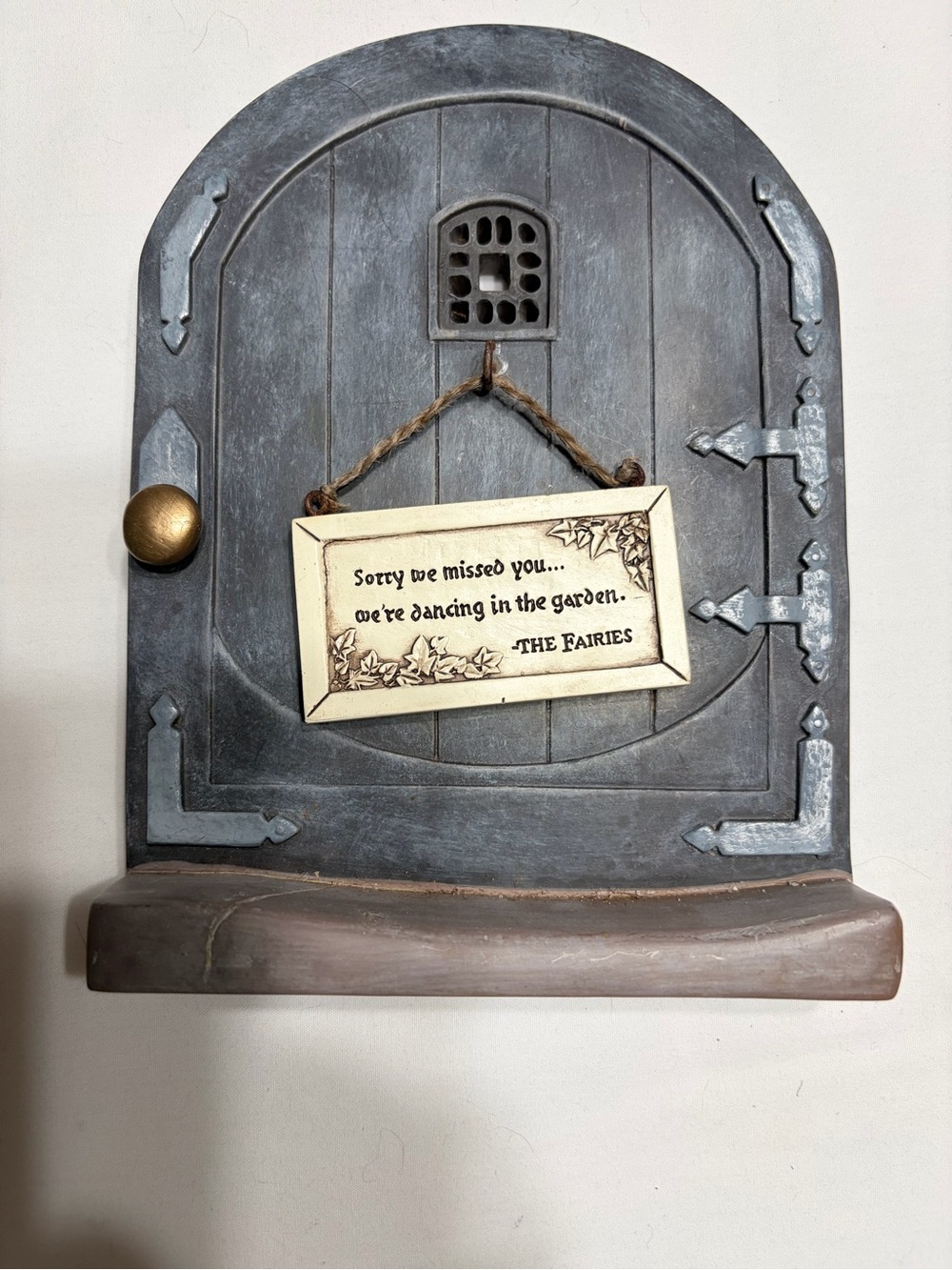 Fairy Door Wall Accent in resin Dark Gray-Green antiqued with gold doorknob.